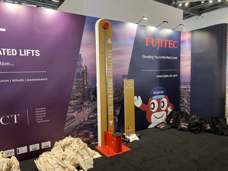 Fujitec branding on the High Striker for an indoor event.