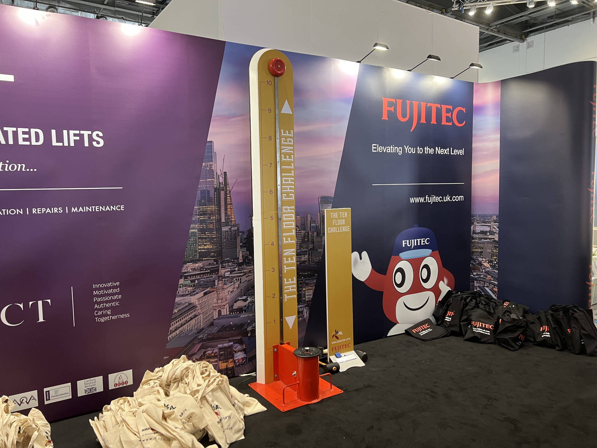 Fujitec branding on the High Striker for an indoor event.