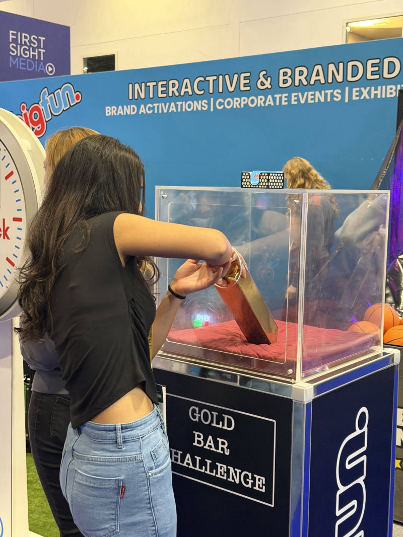 Player trying to remove the weighted Gold Bar.